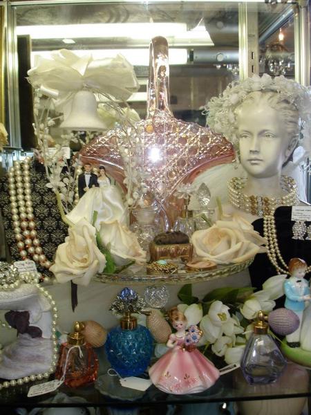 Wedding antiques and collectibles are matchless for a collector captivated by romance. From the sweetness of cake toppers to the tradition of cake charms, there is something for everyone!